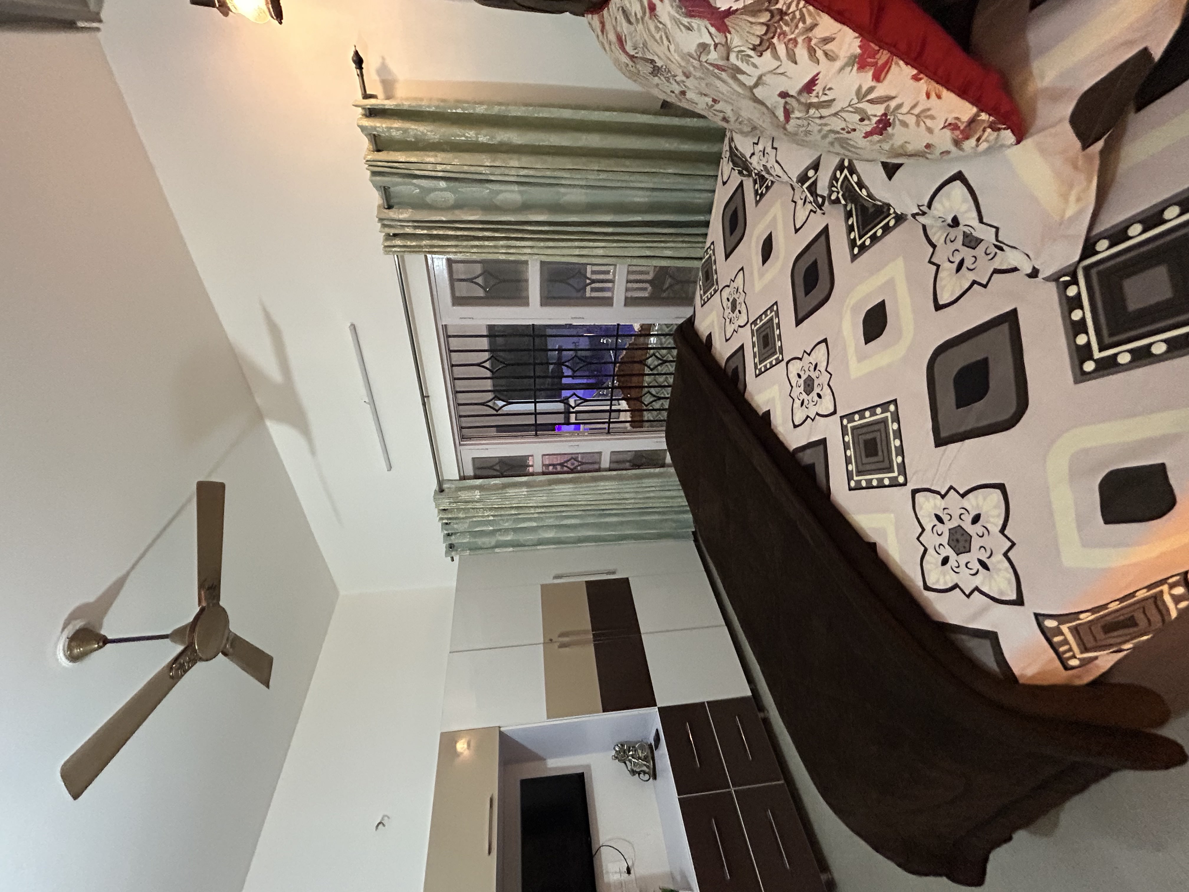Well-lit bedroom interiors at the Dehradun villa