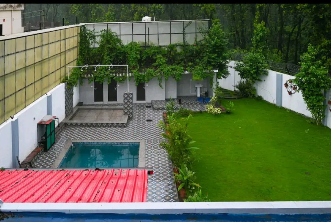 Stunning rooftop view of the Dehradun valley and foothills